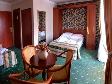 Фото номера Четырехместный номер Курортные отели Biały Dunajec Resort &amp; Spa г. Бялы-Дунаец 8