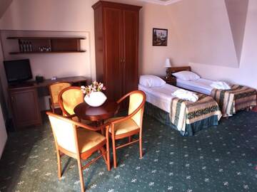 Фото номера Четырехместный номер Курортные отели Biały Dunajec Resort &amp; Spa г. Бялы-Дунаец 9