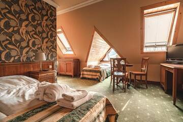 Фото номера Четырехместный номер Курортные отели Biały Dunajec Resort &amp; Spa г. Бялы-Дунаец 7