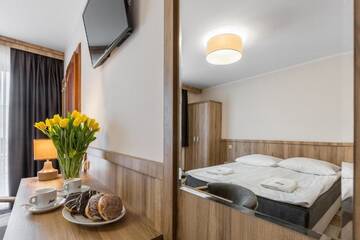 Фото номера Двухместный номер с 2 отдельными кроватями Курортные отели Ośrodek Wypoczynkowy Borowy г. Бялы-Дунаец 9