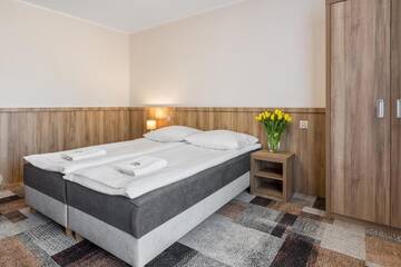 Фото номера Двухместный номер с 2 отдельными кроватями Курортные отели Ośrodek Wypoczynkowy Borowy г. Бялы-Дунаец 8
