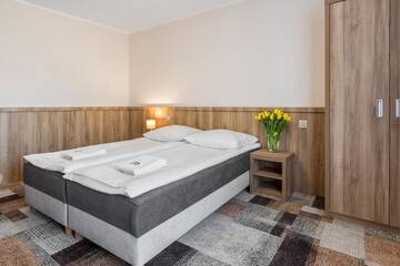 Фото номера Двухместный номер с 2 отдельными кроватями Курортные отели Ośrodek Wypoczynkowy Borowy г. Бялы-Дунаец 4